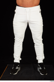 Dave black sneakers dressed leg lower body white pants 0001.jpg